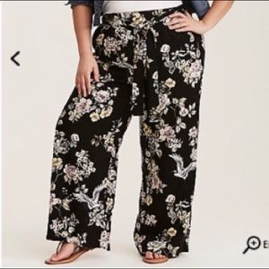 Torrid wide leg pants with flowers and bird on it